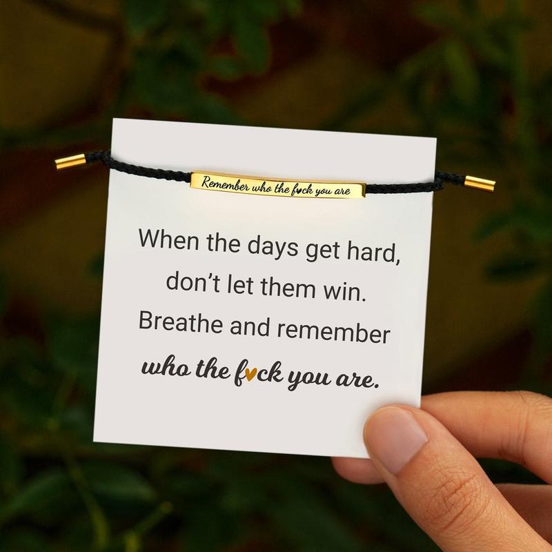 Gold-tone Don't Let The Hard Days Win bracelet with printed encouragement card