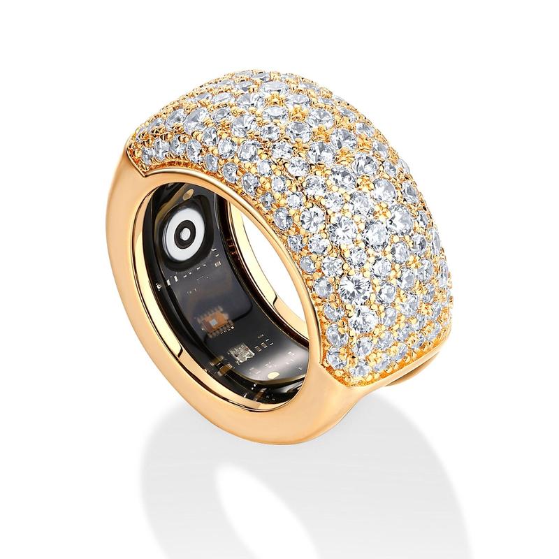 The pavé ring cover with an Oura Ring sitting inside it