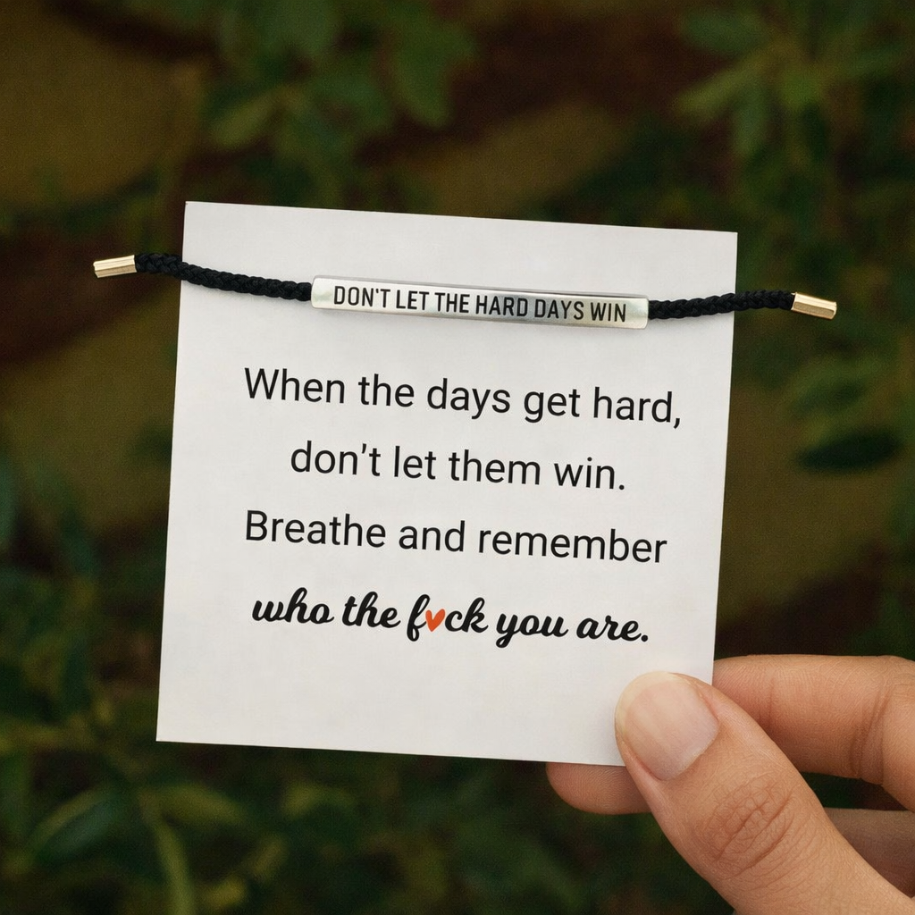 Black cord version of motivational engraved bracelet